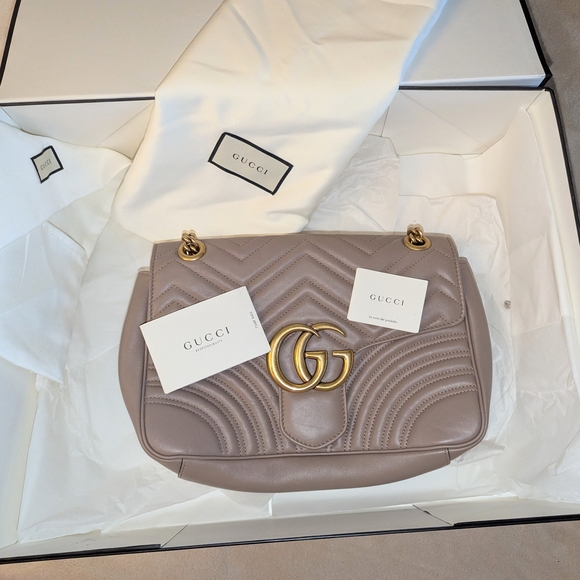 Gucci Handbags - Gucci Beige Leather Shoulder Bag with Gold Accents